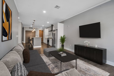 a living room with a couch and a coffee table at Nineteen North Apartments , Buffalo, NY, 14202